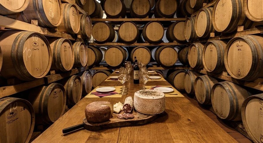 Underground wine cantina in Montepulciano carved into volcanic tufa rock, tasting Vino Nobile DOCG Tuscany